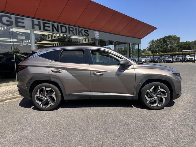 Hyundai TUCSON 1.6 T-GDI HEV Premium | Trekhaak 1650kg! | Leder | Blind-spot | 360 Cam | Adaptive CC | Stoel-koeling/verwarming |