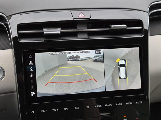 Hyundai TUCSON 1.6 T-GDI PHEV Premium 4WD / SOH 100% / Fabrieksgarantie tot 05-2027 / Dealer onderhouden / Trekhaak afneembaar / Stoelventilatie / Elektrische achterklep / Trekgewicht 1350 kg / Stuur- Stoel & Achterbank verwarming / Rondomzicht camera /