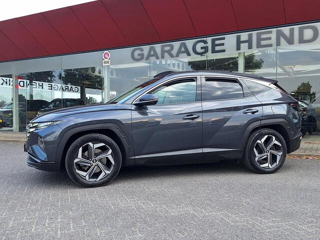 Hyundai TUCSON 1.6 T-GDI PHEV Premium Sky 4WD | Full Options! | Dealer onderhouden! | Trekhaak | Pano | Leder | LED | Blindspot |