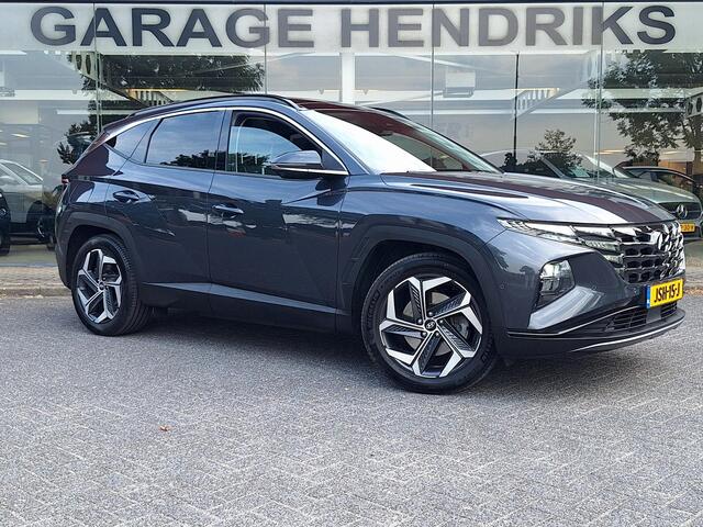 Hyundai TUCSON 1.6 T-GDI PHEV Premium Sky 4WD | Full Options! | Dealer onderhouden! | Trekhaak | Pano | Leder | LED | Blindspot |