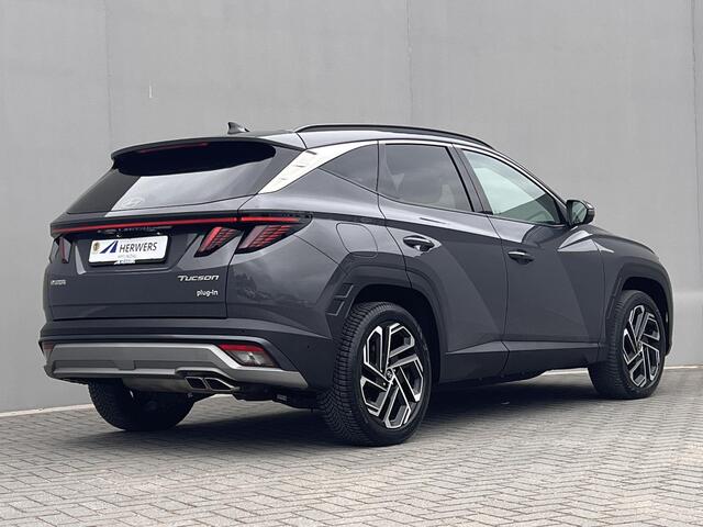 Hyundai TUCSON 1.6 T-GDI PHEV Premium 4WD / Accu SoH 100 % / EAER 65 km / Leder / HUD / Navigatie / Apple Carplay Android / Stoelventilatie / Stuur-, stoel- & achterbankverwarming / 19" LM wielen & All Season banden /