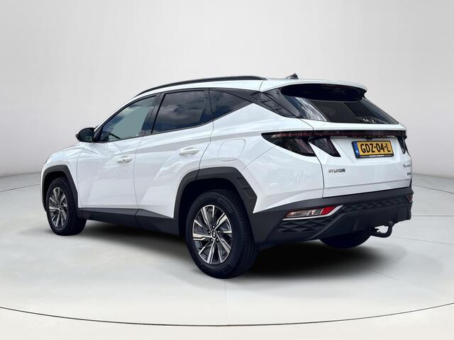 Hyundai TUCSON 1.6 T-GDI HEV Comfort Smart | Stoel en stuurverwarming | Trekhaak | Adaptieve cruise control | Elektrische achterklep | Achteruitrij camera | Parkeersensoren voor en achter |