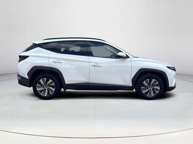 Hyundai TUCSON 1.6 T-GDI HEV Comfort Smart | Stoel en stuurverwarming | Trekhaak | Adaptieve cruise control | Elektrische achterklep | Achteruitrij camera | Parkeersensoren voor en achter |