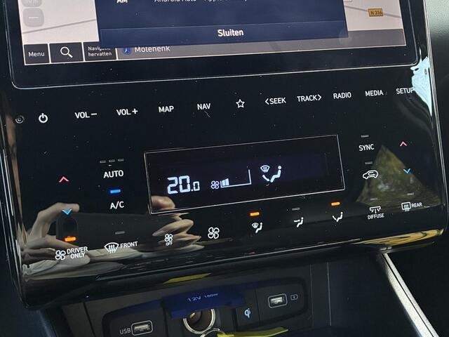 Hyundai TUCSON 1.6 T-GDI PHEV N Line Edition 4WD / Dealer onderhouden / Fabrieksgarantie tot 04-2027 / Stuur- & Stoelverwarming / Trekgewicht 1350 kg / Elektrische achterklep / Achteruitrijcamera / Apple Carplay/Android Auto / Adaptief cruise control /