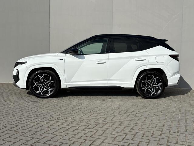 Hyundai TUCSON 1.6 T-GDI PHEV N Line Edition 4WD / Dealer onderhouden / Fabrieksgarantie tot 04-2027 / Stuur- & Stoelverwarming / Trekgewicht 1350 kg / Elektrische achterklep / Achteruitrijcamera / Apple Carplay/Android Auto / Adaptief cruise control /