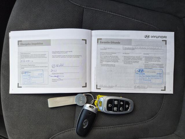 Hyundai TUCSON 1.6 T-GDI PHEV N Line Sky 4WD / SOH 100% / Fabrieksgarantie tot 12-2027 / Dealer onderhouden / Trekhaak afneembaar / Glazen schuif- en kanteldak / Trekgewicht 1350 kg / Adaptief cruise control / Rondomzicht camera / Stuur- Stoel & Achterbank verwarming /