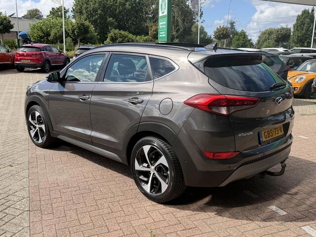 Hyundai TUCSON 1.6 T-GDi Premium 4WD LEDER | KEYLESS ENTRY/G | AUTOMAAT | AWD | CAMERA | ELEKTRISCH VERSTELBARE STOELEN | STOELVERWARMING | STUURVERWARMING | STUURKOELING | PANORAMADAK | NAVIGATIE | LED | XENON KOPLAMPEN | APPLE CARPLAY / ANDROID AUTO | CRUISECONTROL |