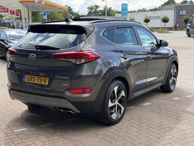 Hyundai TUCSON 1.6 T-GDi Premium 4WD LEDER | KEYLESS ENTRY/G | AUTOMAAT | AWD | CAMERA | ELEKTRISCH VERSTELBARE STOELEN | STOELVERWARMING | STUURVERWARMING | STUURKOELING | PANORAMADAK | NAVIGATIE | LED | XENON KOPLAMPEN | APPLE CARPLAY / ANDROID AUTO | CRUISECONTROL |