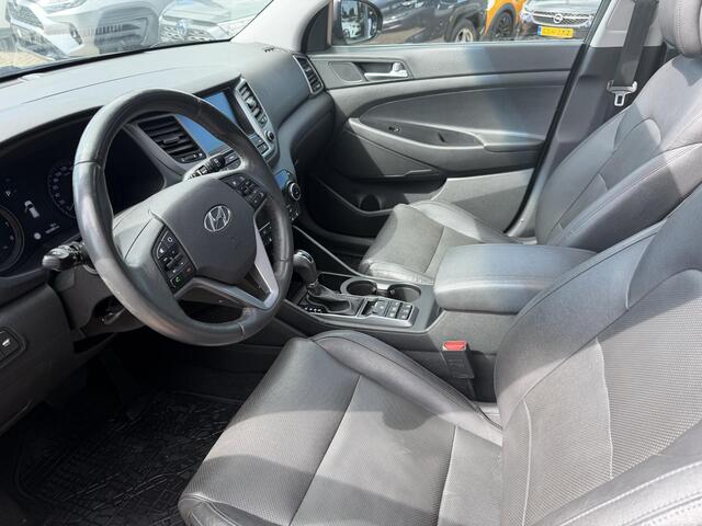Hyundai TUCSON 1.6 T-GDi Premium 4WD LEDER | KEYLESS ENTRY/G | AUTOMAAT | AWD | CAMERA | ELEKTRISCH VERSTELBARE STOELEN | STOELVERWARMING | STUURVERWARMING | STUURKOELING | PANORAMADAK | NAVIGATIE | LED | XENON KOPLAMPEN | APPLE CARPLAY / ANDROID AUTO | CRUISECONTROL |