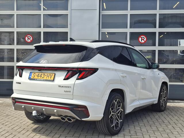 Hyundai TUCSON 1.6 T-GDI HEV N Line Sky | Navigatie/Android/Apple Carplay | LMV 19" | Elektrisch Glazen Panoramadak | Adaptieve Cruise Control | Voorstoelen/Achterbank Verwarmd | Rondomzichtcamera | Airco Automatisch |