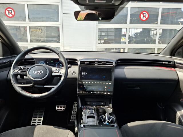Hyundai TUCSON 1.6 T-GDI HEV N Line Sky | Navigatie/Android/Apple Carplay | LMV 19" | Elektrisch Glazen Panoramadak | Adaptieve Cruise Control | Voorstoelen/Achterbank Verwarmd | Rondomzichtcamera | Airco Automatisch |