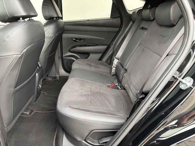 Hyundai TUCSON 1.6 T-GDI PHEV N Line Sky 4WD / Facelift / Fabrieksgarantie tot 12-2029 / Dealer onderhouden / Panorama schuifdak / Navigatie / Camera / Elektrische Achterklep / Stuur & Stoelverwarming / Apple Carplay Android / 19" LM wielen /