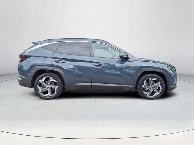 Hyundai TUCSON 1.6 T-GDI PHEV Premium Sky 4WD | Panoramisch schuif/kantel dak | Apple Carplay/Android Auto | Stoel/stuurverwarming | 360 graden camera | Krell audio | Elektrische achterklep | Stoelgeheugen | Lichtmetalen velgen | Stoelverkoeling |