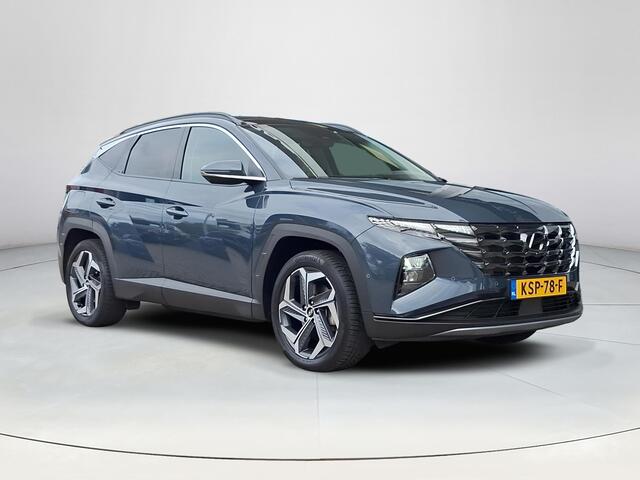 Hyundai TUCSON 1.6 T-GDI PHEV Premium Sky 4WD | Panoramisch schuif/kantel dak | Apple Carplay/Android Auto | Stoel/stuurverwarming | 360 graden camera | Krell audio | Elektrische achterklep | Stoelgeheugen | Lichtmetalen velgen | Stoelverkoeling |