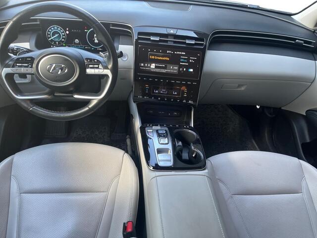 Hyundai TUCSON Premium 1.6 T-GDI HEV 230pk | WIT LEDER | APPLE CARPLAY / ANDROID AUTO | ADAPTIVE CRUISE | MEMORY FUNCTIE | 360° CAMERA |