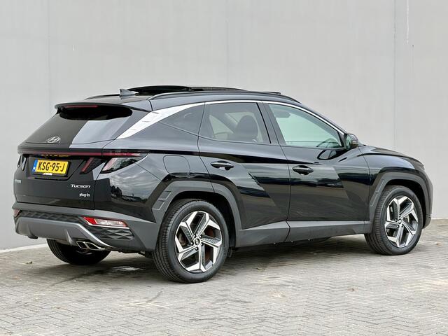 Hyundai TUCSON 1.6 T-GDI PHEV Comfort Smart Sky 4WD / Dealer Onderhouden / SOH 100% / Panoramadak / Adaptief Cruise Control / Navigatie / Achteruitrijcamera / Apple Carplay & Android Auto / Stoel & Stuurverwarming / 19" LM Velgen / Elektrische Achterklep /