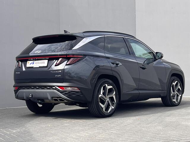 Hyundai TUCSON 1.6 T-GDI PHEV Comfort Smart 4WD / 1.350 kg Afn. trekhaak / Dealer Onderhouden / Fabrieksgarantie tot 6-2029 / Accu SoH 89% / Elektrische klep / Stuur- en stoelverwarming / Navi / Apple Carplay Android / 19" LM wielen /