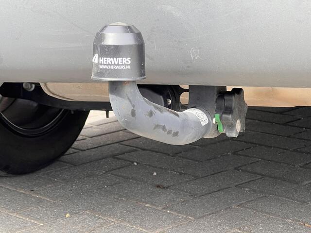 Hyundai TUCSON 1.6 T-GDI PHEV Comfort Smart 4WD / 1.350 kg Afn. trekhaak / Dealer Onderhouden / Fabrieksgarantie tot 6-2029 / Accu SoH 89% / Elektrische klep / Stuur- en stoelverwarming / Navi / Apple Carplay Android / 19" LM wielen /