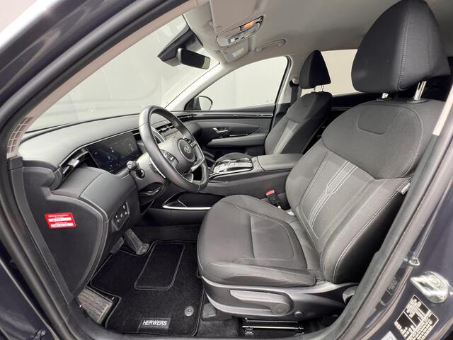Hyundai TUCSON 1.6 T-GDI PHEV Comfort Smart 4WD / 1.350 kg Afn. trekhaak / Dealer Onderhouden / Fabrieksgarantie tot 6-2029 / Accu SoH 89% / Elektrische klep / Stuur- en stoelverwarming / Navi / Apple Carplay Android / 19" LM wielen /