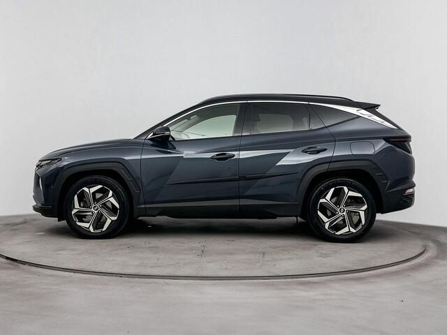 Hyundai TUCSON 1.6 T-GDI HEV Premium | Trekhaak | Navigatie | Camera | Stoel verwarming & verkoeling | Dodehoek detectie |