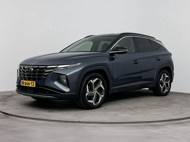Hyundai TUCSON 1.6 T-GDI HEV Premium | Trekhaak | Navigatie | Camera | Stoel verwarming & verkoeling | Dodehoek detectie |