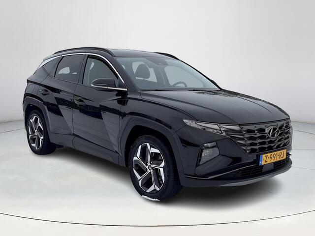 Hyundai TUCSON 1.6 T-GDI PHEV Comfort Smart 4WD | Trekhaak | Elektische achterklep | Apple carplay & Android Auto | Keyless entry & start | Stoel & Stuurverwarming | Rijklaarprijs!