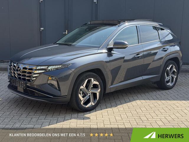 Hyundai TUCSON 1.6 T-GDI HEV 230pk Premium Sky / Schuif Kantel Dak / 360 Graden Camera / Adaptieve Cruise Control / Apple Carplay / Stoelventilatie/ Stoelverwarming / Stuurwielverwarming