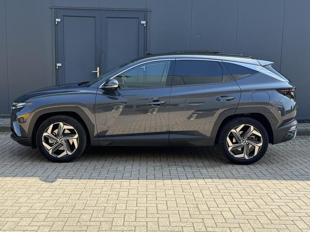 Hyundai TUCSON 1.6 T-GDI HEV 230pk Premium Sky / Schuif Kantel Dak / 360 Graden Camera / Adaptieve Cruise Control / Apple Carplay / Stoelventilatie/ Stoelverwarming / Stuurwielverwarming