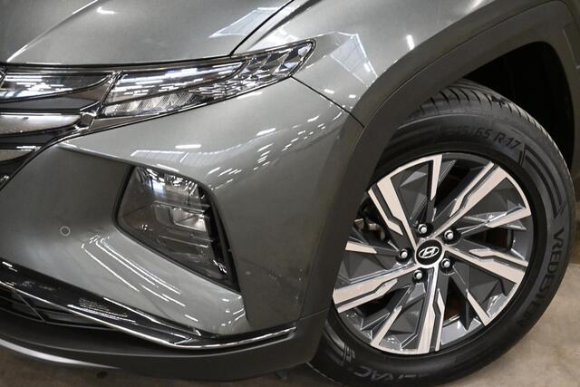 Hyundai TUCSON 1.6 T-GDI HEV Comfort Smart | CAMERA | STUUR/STOELVERWARMING | NAVI | ADAPT. CRUISE CONTROL | CLIMATE CONTROL | PDC | LMV
