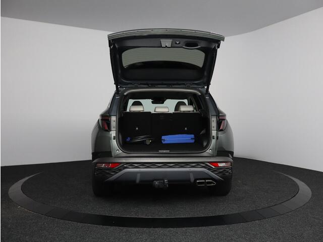 Hyundai TUCSON 1.6 T-GDI PHEV Premium Sky 4WD | Glazen schuif-kanteldak | Trekhaak
