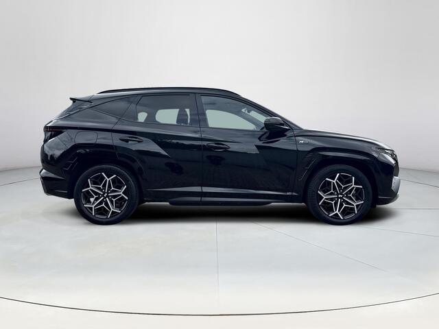 Hyundai TUCSON 1.6 T-GDI PHEV N Line 4WD | SOH 97,2% | Schuif-Kanteldak | Stoelverwarming/Ventilatie | Stuurverwarming | Elektrische stoelen met geheugenfunctie | 360* Camera |