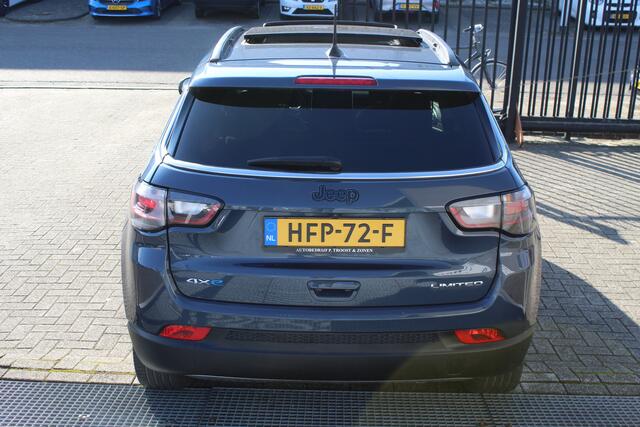 Jeep COMPASS 4xe 190 Plug-in Hybrid Electric Limited Lease Ed. AUTOMAAT/\Panoramadak/Adaptive cruise control/Lane assist/Navigatie/Achteruitrijcamera/Climate control/Elektrisch sluitende achterklep/Keyless/19'' Lichtmetalen velgen/LED koplampen.