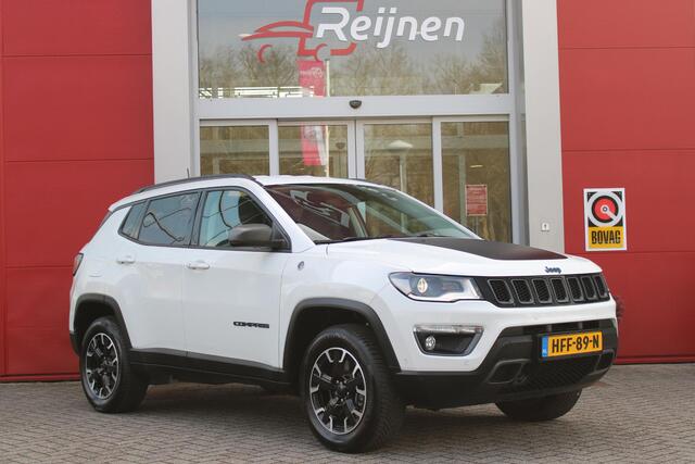 Jeep COMPASS 4xe 240PK PHEV TRAILHAWK AUTOMAAT | NAVIGATIE | ACHTERUIRIJCAMERA | APPLE CARPLAY / ANDROID AUTO | DIGITALE COCKPIT | XENON KOPLAMPEN | 17" OFF-ROAD LICHTMETALEN VELGEN | ALL SEASON BANDEN | CRUISE CONTROL | 4 WIELAANDRIJVING | PARKEERSENSOREN VOOR / ACHT