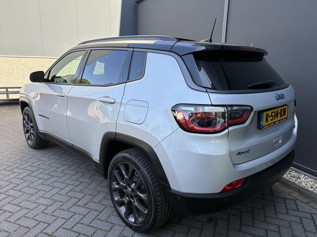 Jeep COMPASS 4xe 240 Plug-in Hybrid Electric Trailhawk Airco - Schuif/kanteldak - Achteruitrijcamera - Apple carplay - Parkeersensoren - Navigatie - Oplaadmogelijkheid - Lederen bekleding - Cruise control - Dakrails - Led verlichting - Elektrische ramen - Bluetooth -