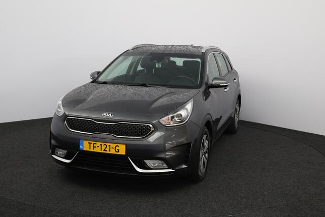 KIA Niro 1.6 GDi Hybrid DynamicLine/ 16'' LMV/ Apple + Android/ Lane-Assist./ Half-Leder/ Navi/ Clima/ Cruise/ Bluetooth/ Armsteun/ Multi. LEDER. Stuur/ PDC/ Chroom/ LED Dagrijverl.