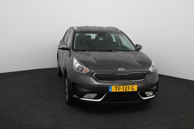 KIA Niro 1.6 GDi Hybrid DynamicLine/ 16'' LMV/ Apple + Android/ Lane-Assist./ Half-Leder/ Navi/ Clima/ Cruise/ Bluetooth/ Armsteun/ Multi. LEDER. Stuur/ PDC/ Chroom/ LED Dagrijverl.