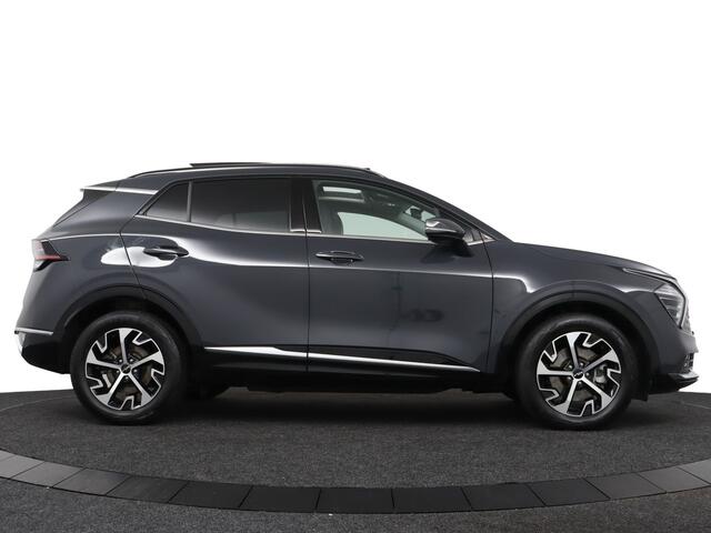 KIA SPORTAGE 1.6 T-GDi Hybrid DynamicPlusLine - Adaptive Cruise - Stoel/Stuurverwarming - Schuif/Kanteldak - Navigatie - DAB - Apple Carplay/Android Auto Fabrieksgarantie 01-2033 Fabrieksgarantie tot 01-2032