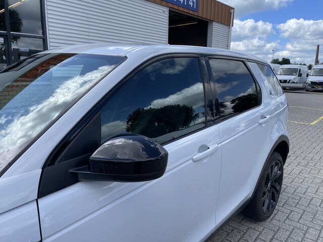 Land Rover DISCOVERY SPORT grijs kenteken / ¤ 16.950 ex btw / lease vanaf ¤ 674 / airco / cruise / panorama dak / trekhaak / wit metallic !
