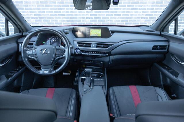 Lexus Ux 250h F Sport First Edition | Triple LED Koplampen | Achteruitrijcamera | Parkeersensoren | Keyless Entry | Elektrische Achterklep | Elektrisch Verstelbare Voorstoelen | Stoelverwarming | Cruise Control Adaptief | Dodehoekdetectie | Navigatie