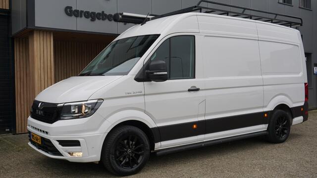 MAN TGE 35 2.0 TDI 140pk DSG L3H3 3-Zits Navi 17inch Trekhaak Geveerde Stoel *Imperiaal & Luxe inrichting laadruimte* *NL MAN* 117809km!