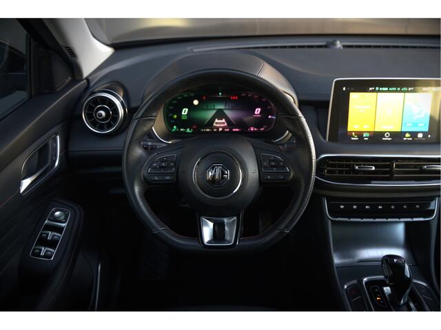 MG EHS 1.5 TGDI Luxury | Panoramadak | Keyless | Fabrieksgarantie | Elektrische Stoelen | Dodehoek Detectie | Navigatie | Adaptive Cruise Control | Stoelverwarming | 360 Camera | Leer | Apple Carplay | B
