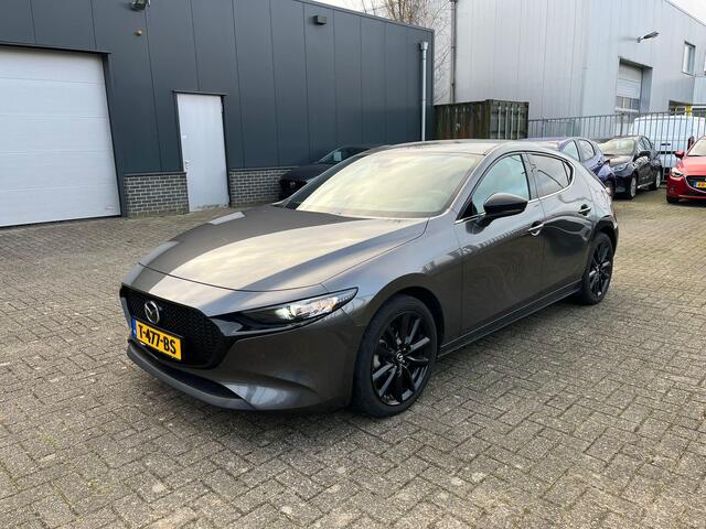 Mazda 3 2.0 e-SkyActiv-G M Hybrid 150 Homura , Adap. Cruise, LMV 18 Inch, PDC, Camera, Navi, Apple Carplay, Clima, Stoelverwarming, HUD, Stoffen bekleding