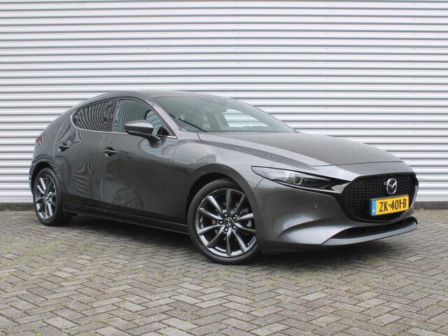 Mazda 3 2.0 e-SkyActiv-G M Hybrid 122 Luxury | Trekhaak | Stuur-/stoelverwarming | Leer | 360 Camera | Stoelgeheugen | 18" LM | HUD | LED | Cruise adapt. |