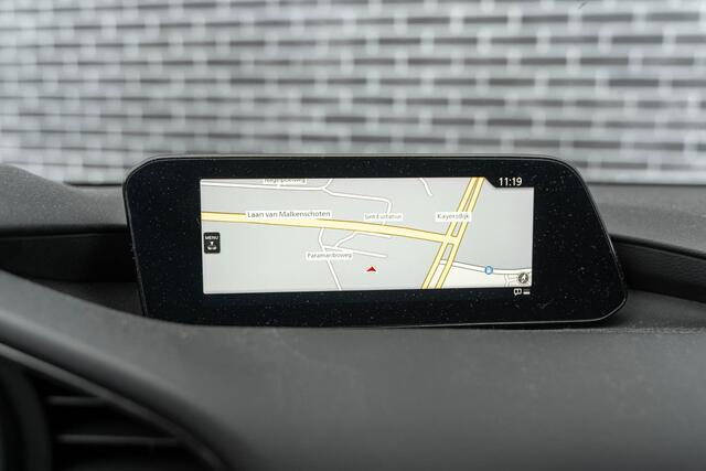 Mazda 3 2.0 e-SkyActiv-G M Hybrid 150 Homura | Head-Up Display | All-Season Banden | Achteruitrijcamera | Parkeersensoren | LED Koplampen | Cruise Control Adaptief | Dodehoekdetectie | Stoelverwarming | Navigatie | Apple Carplay | Android Auto