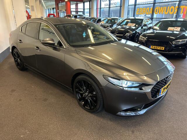 Mazda 3 2.0 e-SkyActiv-G M Hybrid 122 Luxury | Adaptieve cruise control | Stoel+Stuurverwarming | Head up display | Keyless | Achteruitrijcamera | Bose audio | Lederen bekleding | Navigatie | Climate control | Memory seats – foto 9