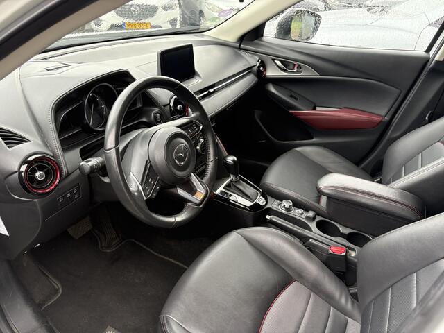 Mazda CX-3 2.0 SkyActiv-G 120 GT-M , Automaat, Trekhaak, Navi, Camera, Leder/stof, Adap-Cruise, Stuur/Stoel Verwarming, Bose, Clima, HUD, LKA, PDC, LMV 18 inch, Armsteun