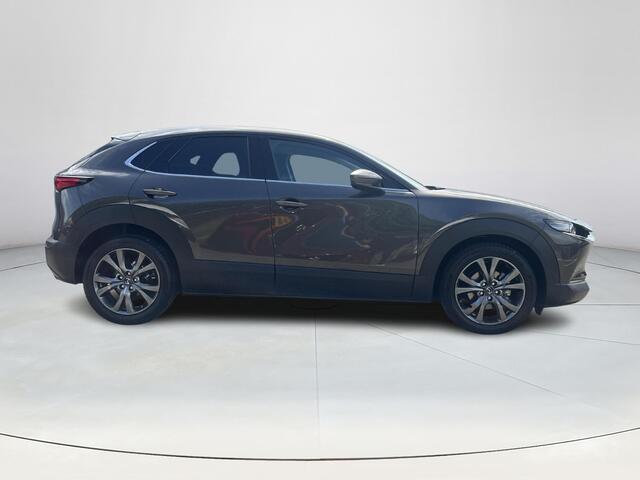 Mazda CX-30 2.0 e-SkyActiv-X M Hybrid Luxury | Dealer onderhouden | Achteruitrijcamera | Parkeersensoren voor en achter | Elektrische achterklep | Stoel en Stuurverwarming | Bose | Lederbekleding met stoelgeheugen | HeadupDisplay | Full LED Koplampen | Applecarplay 