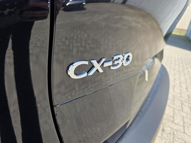Mazda CX-30 2.5 e-SkyActiv-G M Hybrid Homura | Dodehoeksensoren | Draadloze Applecarplay en Android Auto | Adaptieve Cruise Control | Automaat | 18inch zwarte velgen | Achteruitrijcamera | Elektrische achterklep |