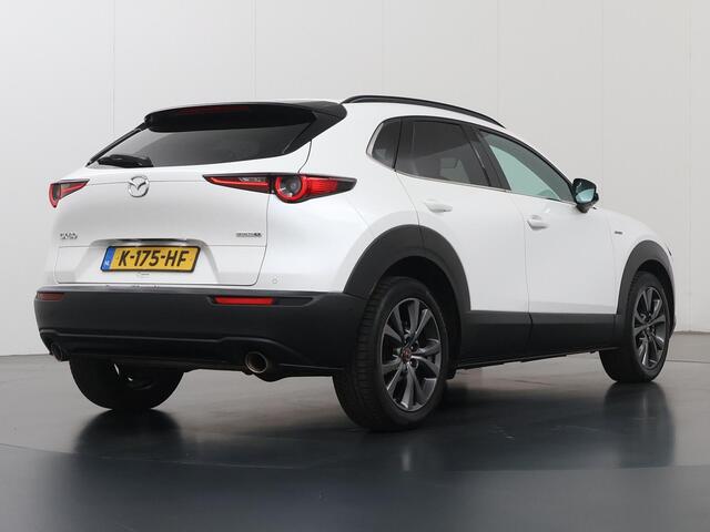 Mazda CX-30 2.0 e-SkyActiv-X M Hybrid100th Anniversary Ed. | Schuif/Kanteldak | Lederen Interieur | Navigatie | 360 Camera | DAB | Stoel/Stuurverwarming | Adaptieve Cruise Control | Ele.verstelbare stoel + geheugen | Bose Audio |