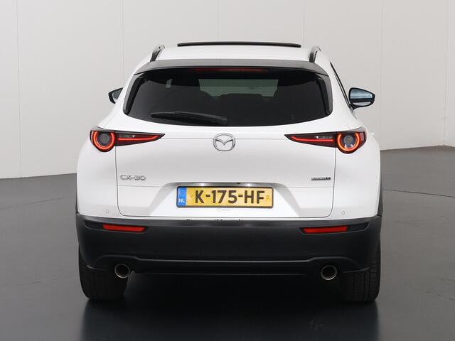 Mazda CX-30 2.0 e-SkyActiv-X M Hybrid100th Anniversary Ed. | Schuif/Kanteldak | Lederen Interieur | Navigatie | 360 Camera | DAB | Stoel/Stuurverwarming | Adaptieve Cruise Control | Ele.verstelbare stoel + geheugen | Bose Audio |
